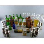 A COLLECTION OF CONTAINERED, GREEN & CLEAR GLASS CHEMIST'S BOTTLES (many with labels)