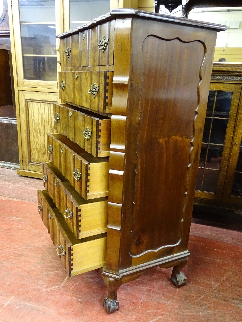 A GOOD REPRODUCTION WALNUT SIX DRAWER CHEST with shaped top and drawers, pierced brasswork, on - Image 2 of 3