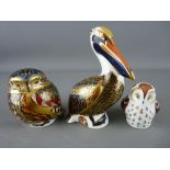 THREE ROYAL CROWN DERBY PAPERWEIGHTS, 'Brown Pelican', 'Owlet', both gold stoppers and numeral