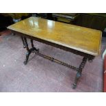 A VICTORIAN MAHOGANY SIDE TABLE with upturned corner finials, bobbin supports and cross stretcher on