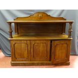 A VICTORIAN MAHOGANY SERVER with shield back rail, carved column supports and triple door lower