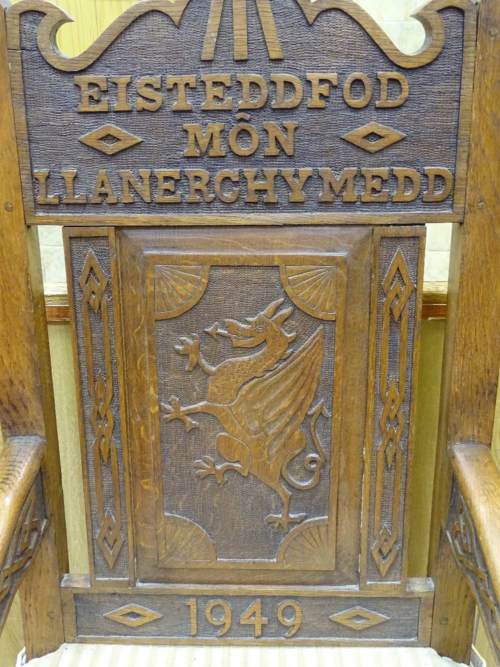 AN ANGLESEY OAK EISTEDDFOD ARMCHAIR with central dragon carved panel, the shaped upper rail - Image 2 of 3