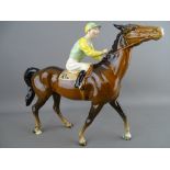 A BESWICK RACE HORSE & JOCKEY (walking race horse), model no. 1037, 21 cms high, green and yellow