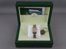 A LADY'S ROLEX OYSTER PERPETUAL DATEJUST YACHTMASTER WRISTWATCH, eighteen carat gold and stainless