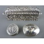 AN EMBOSSED SILVER RECTANGULAR BOX, Birmingham 1899 and two small pill boxes stamped 925 and 800, 73