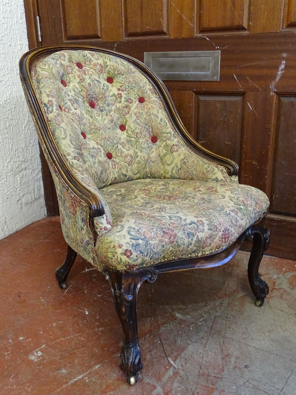 A VICTORIAN CARVED WALNUT SALON CHAIR with button back upholstery, 85.5 cms high, 58 cms wide, 48