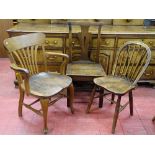 A VINTAGE OAK ELBOW CHAIR, an antique oak farmhouse chair and one other, various measurements