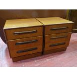 A PAIR OF G-PLAN TEAK THREE DRAWER BEDSIDE CHESTS, 52.5 cms high, 48 cms wide, 45 cms deep