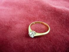 AN EIGHTEEN CARAT GOLD DIAMOND SOLITAIRE DRESS RING, the diamond a visual estimate of 0.4 carats,