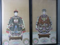 A PAIR OF 19th CENTURY CHINESE ANCESTOR PAINTINGS, gouache with gold highlighting on silk