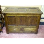 A GOOD REPRODUCTION OAK MULE CHEST with panel lidded top and front over twin lower drawers, on stile