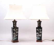 Paar Lampen.China, um 1900. Porzellan, schwarze Glasur dekoriert mit Kirschblütenzweigen und