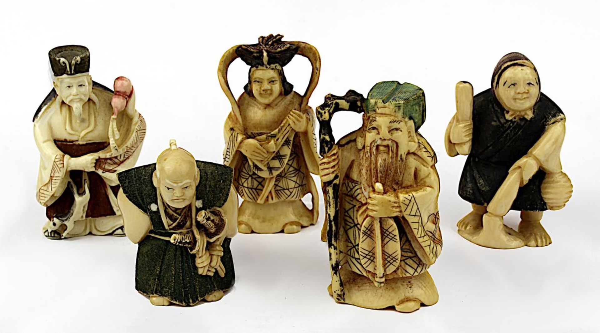 Fünf Netsuke, verschiedene Figurendarstellungen, Elfenbein, Japan 1. Hälfte 20. Jh., partiell mit