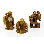 Drei Netsuke Männerdarstellungen, Elfenbein, Japan um 1920, zwei fein geschnitzte Figuren beim
