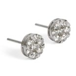 A pair of diamond cluster earrings. 18 ct. white gold and 1,04 ct. brilliant cut diamonds