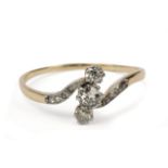A navette shaped ring. 18 ct. yellow gold, platinum and brilliant cut diamonds