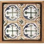 A later 16th century wallplaque with four Catalan showing tiles