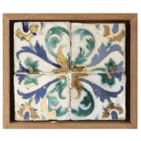 A 16th century wallplaque with four Catalan showing tiles