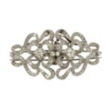 A double clip brooch circa 1940. 18 ct. white gold and 3 ct. brilliant cut diamonds