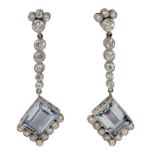 A pair of long earrings. Platinum, 2,10 ct. of brilliant cut diamonds and topaz
