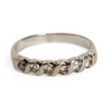 A brilliant cut diamonds half eternity ring with a white gold setting