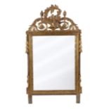 A 19th century carved and gilded wood Empire mirror