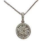A cluster pendant, 18 ct. white gold setting and brilliant cut diamonds