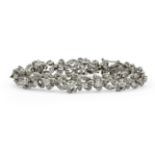 A bracelet circa 1940. Platinum and 8 ct. approx. of brilliant cut and 8/8 cut diamonds