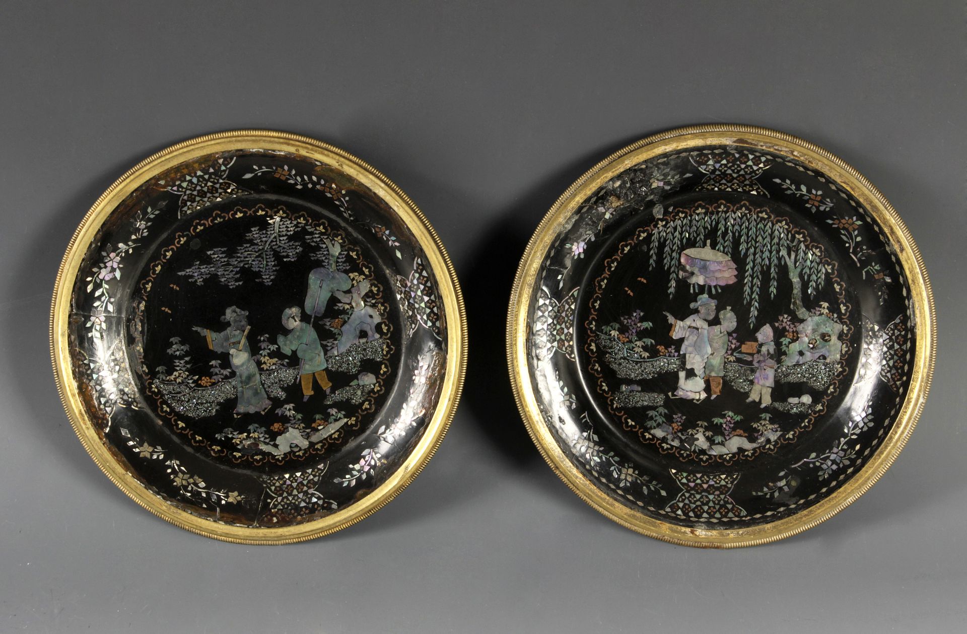 Pair of 18th century Chinese plates in lacquer with embossed mother of pearl