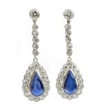 A pair of Belle Époque style long earrings. Platinum, pear cut sapphires and brilliant cut diamonds