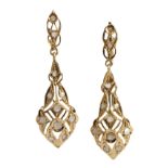 A pair of long earrings circa 1900. 18 ct. yellow gold and rose cut diamonds. With their original c