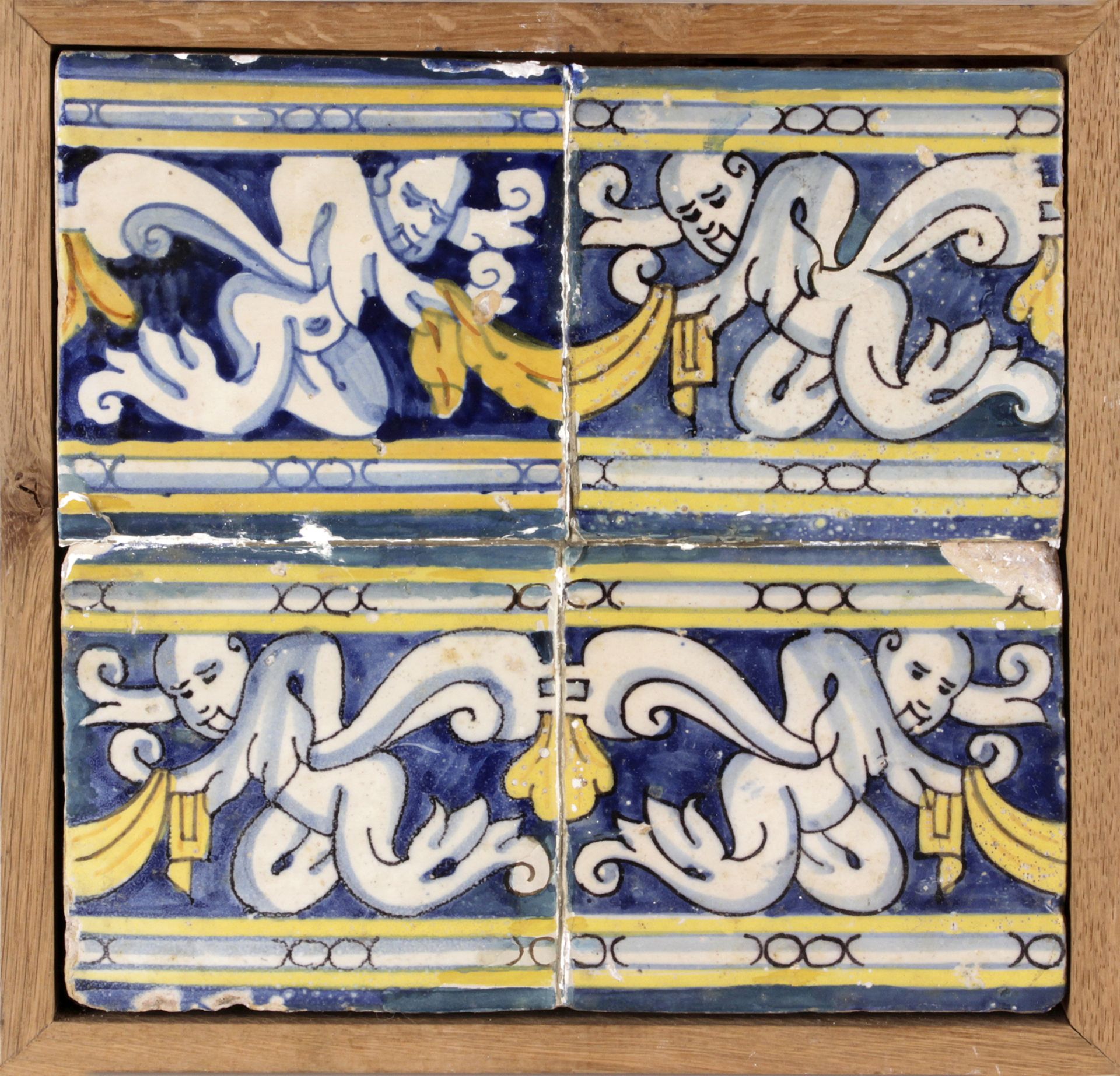 A 16th-17th centuries wallplaque with four Catalan showing tiles