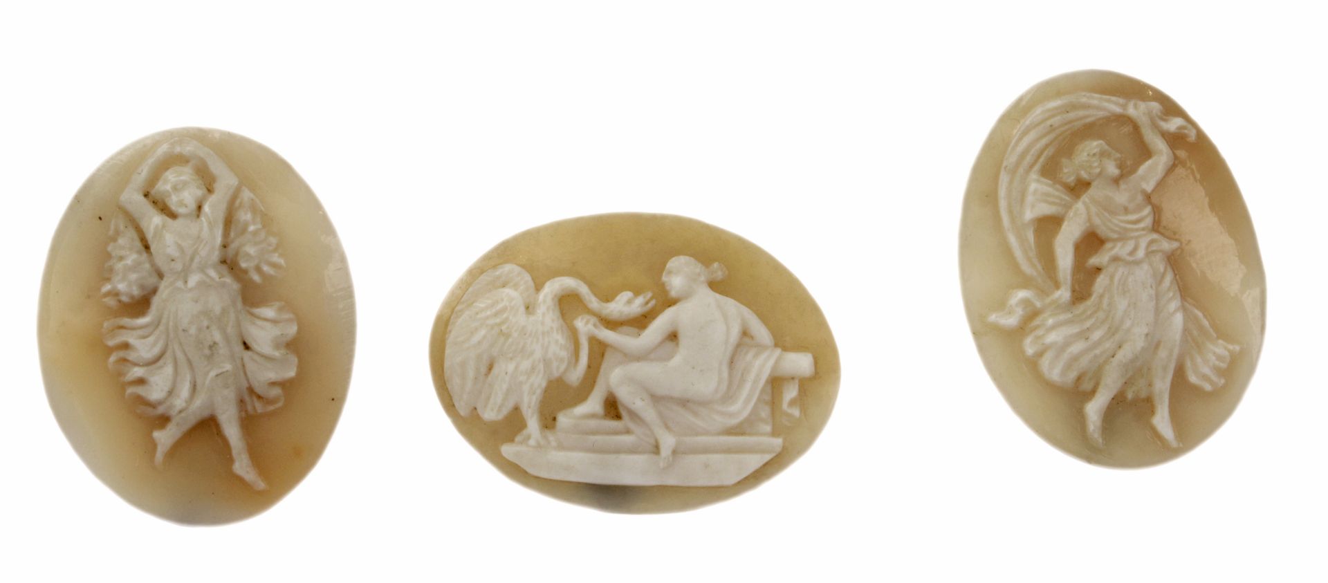 A collection of three cameos in carved shell depicting Leda, Flora and Aurora