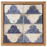 A 16th century wallplaque with four tiles in Talavera pottery