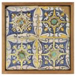 A 17th century wallplaque with four Catalan showing tiles
