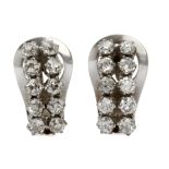 A pair of diamond huggies. 18 ct. white gold setting and 2 ct. of brilliant cut diamonds