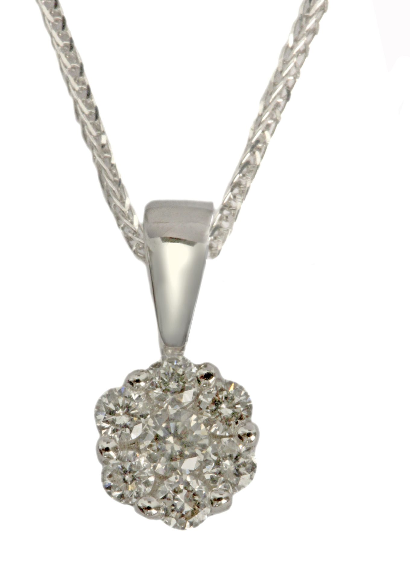 A brilliant cut diamonds cluster pendant in a white gold setting and a white gold chain