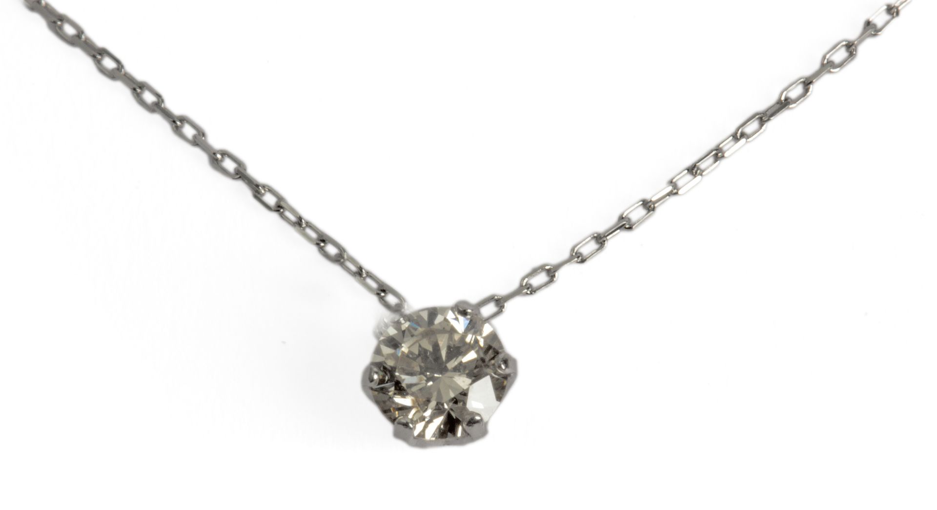 A diamond necklace. A 20 ct. brilliant cut single diamond in a platinum bezel setting with a platin
