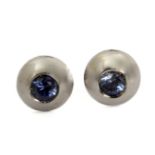 An imitation sapphire stud earrings in an 18k. white gold setting