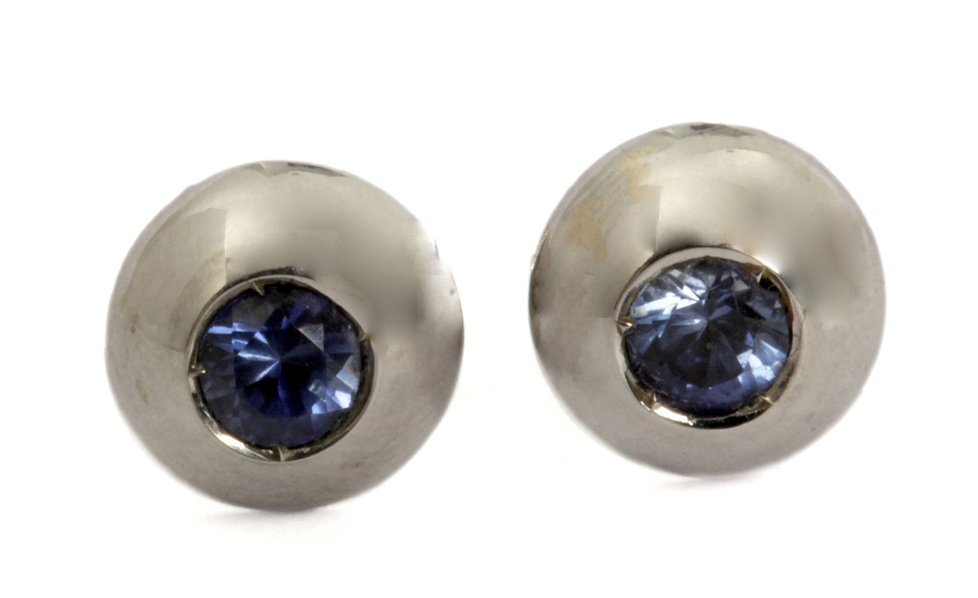 An imitation sapphire stud earrings in an 18k. white gold setting