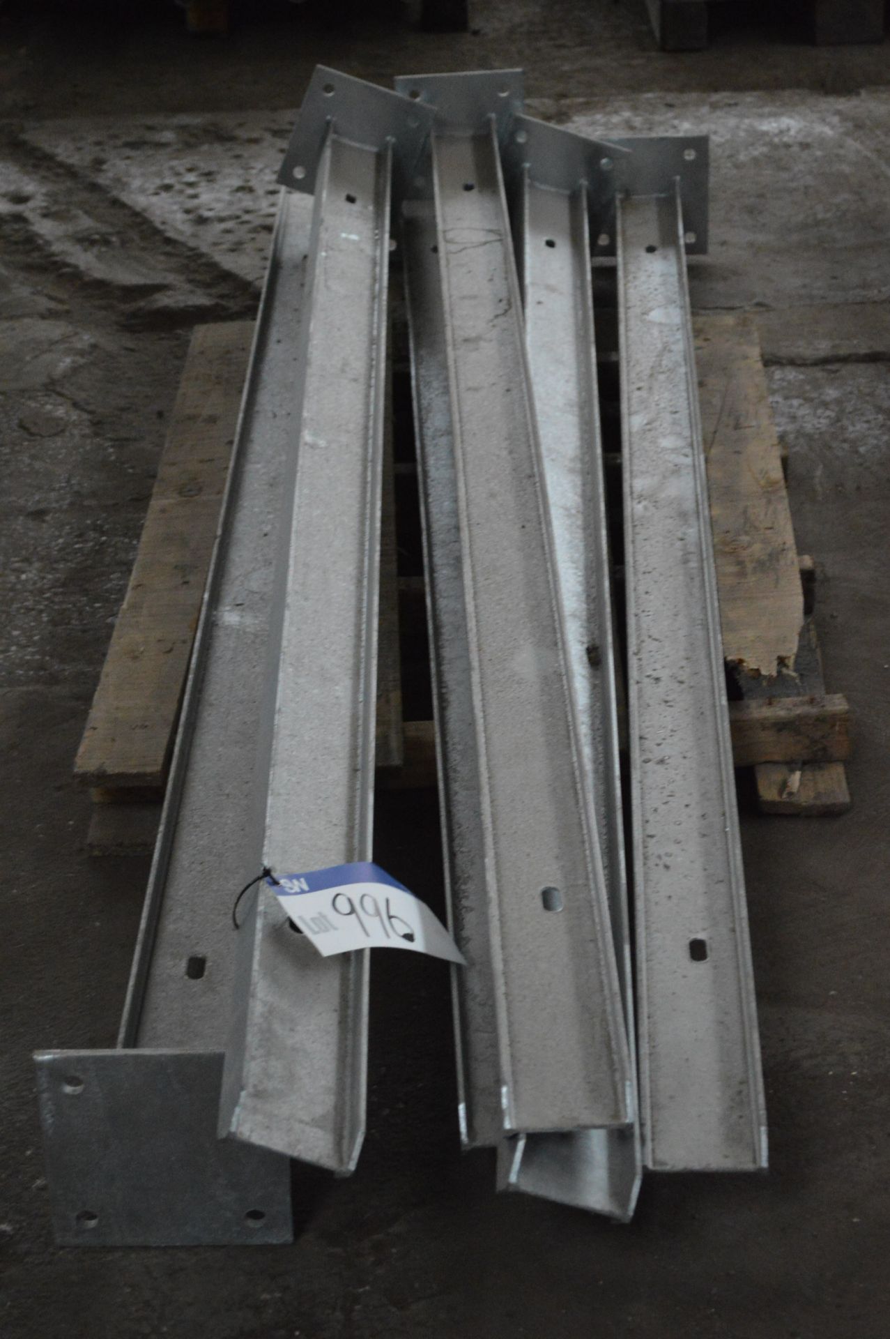 Palisade Fencing Components, as set out on three pallets