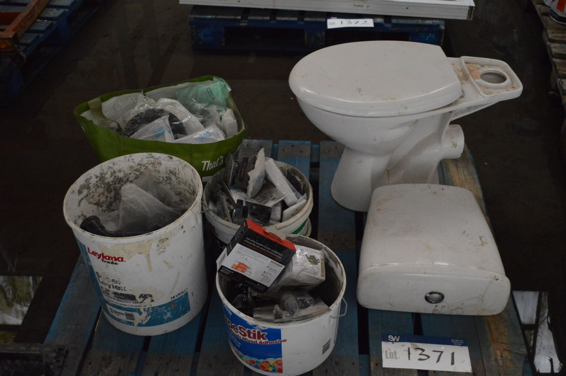 Assorted Equipment, on pallet, including cistern, toilet, fire alarms and pipe fittings