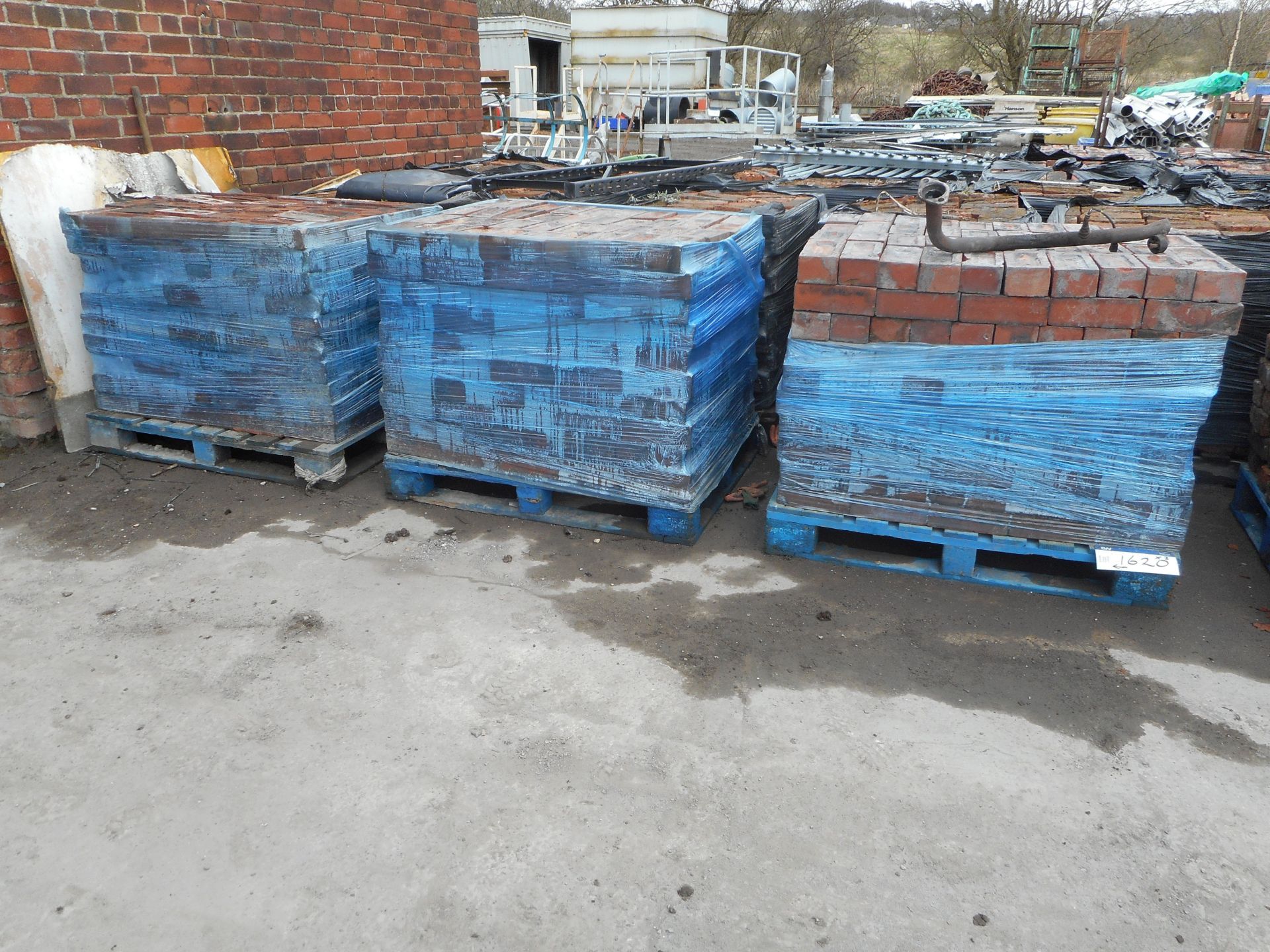 Bricks, on three pallets