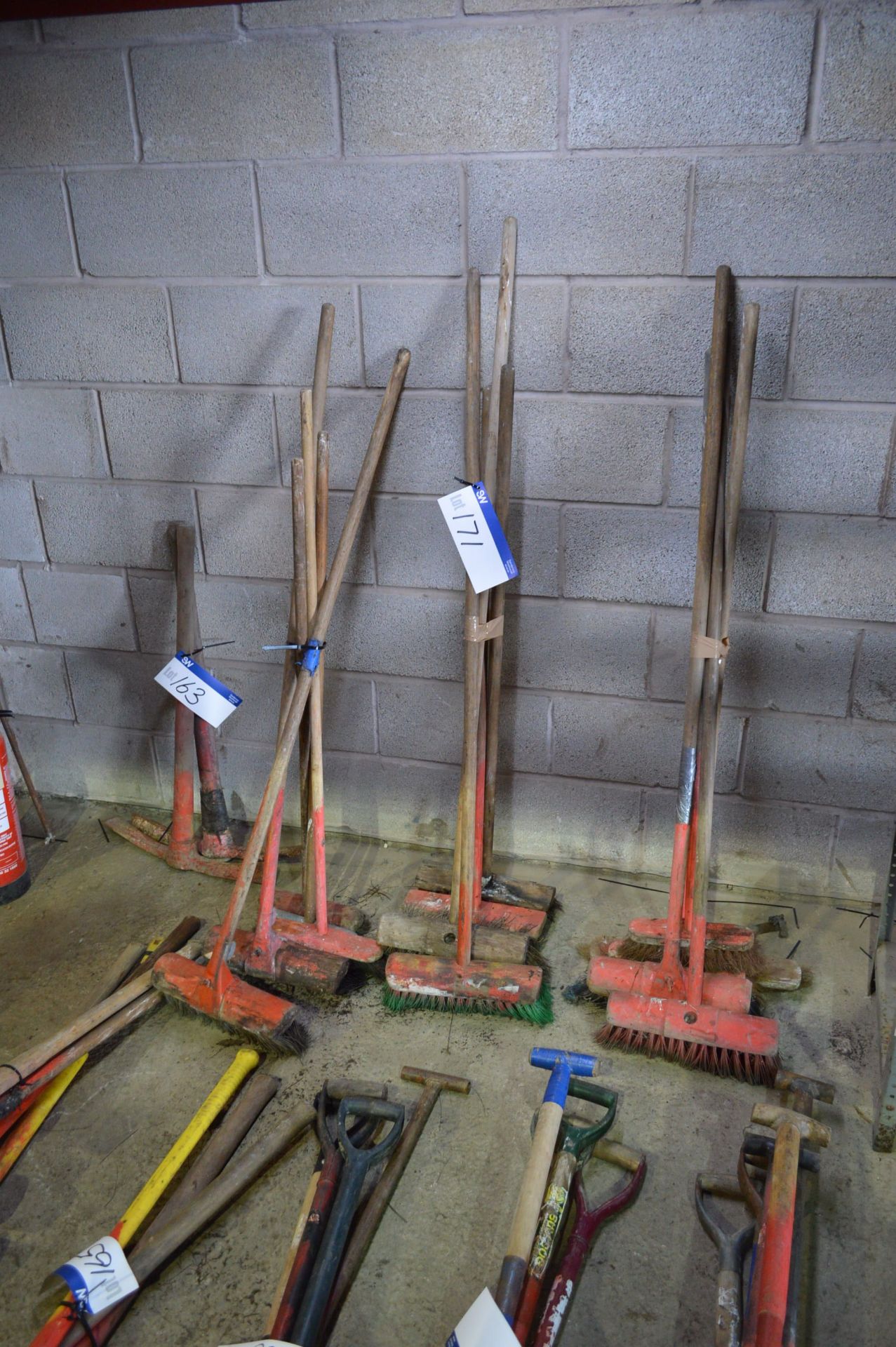 Assorted Brushes, against wall