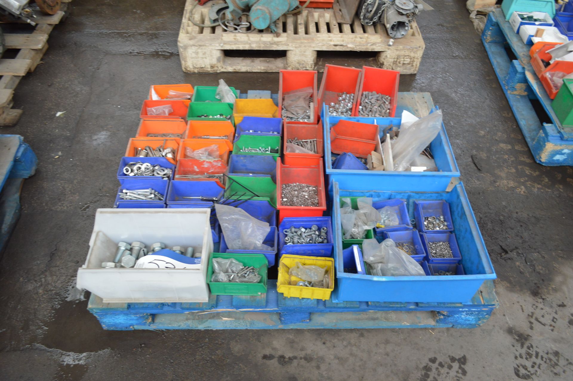 Assorted Fasteners, with plastic boxes on pallet