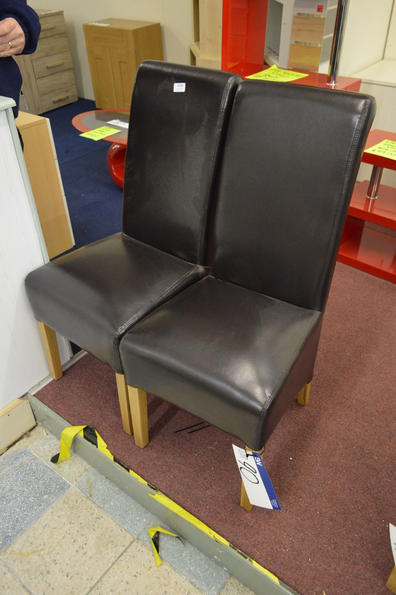 Two Brown Leather Stand Chairs