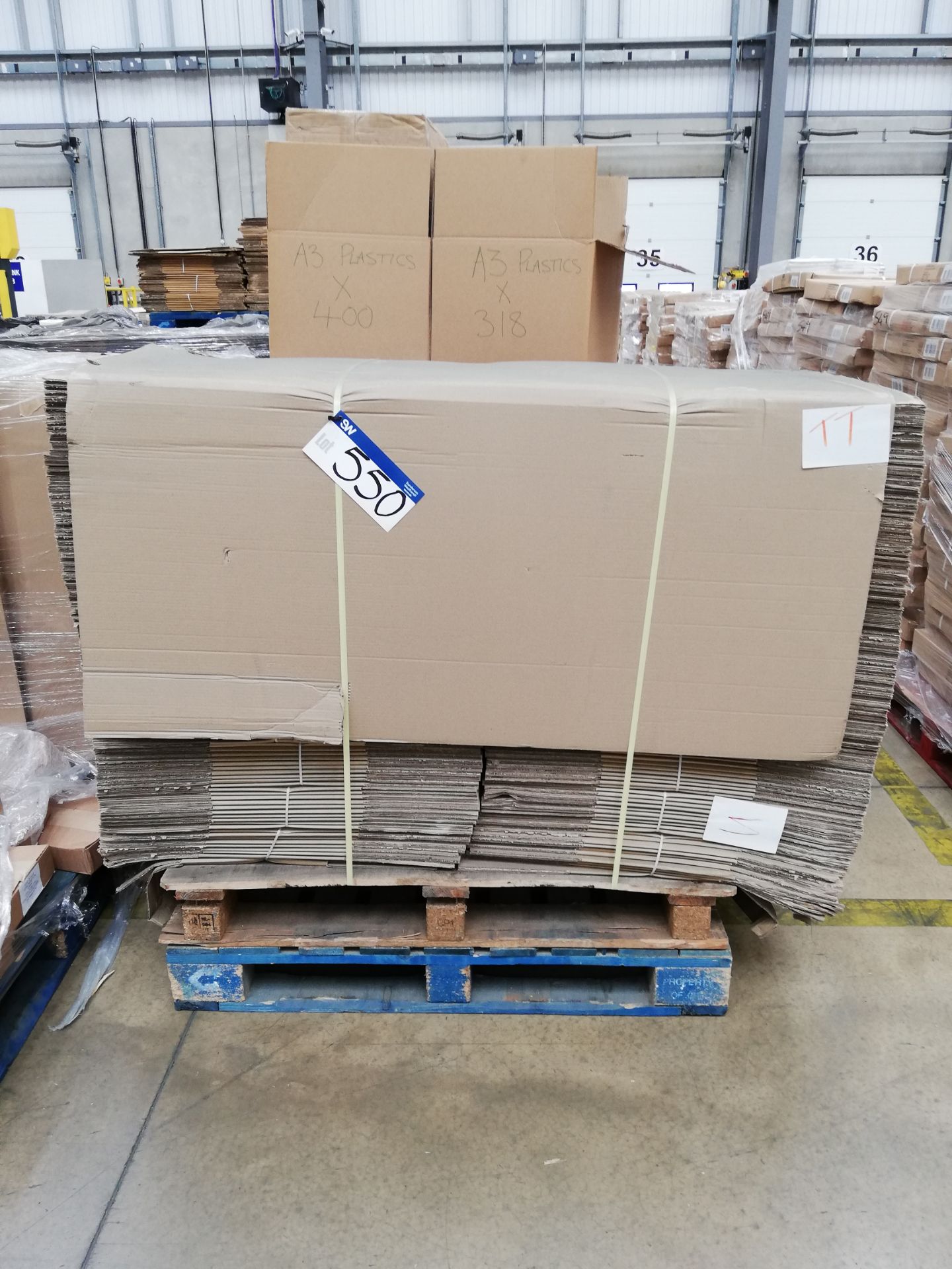 Large Quantity of Flat Pack Cardboard Boxes and Pa