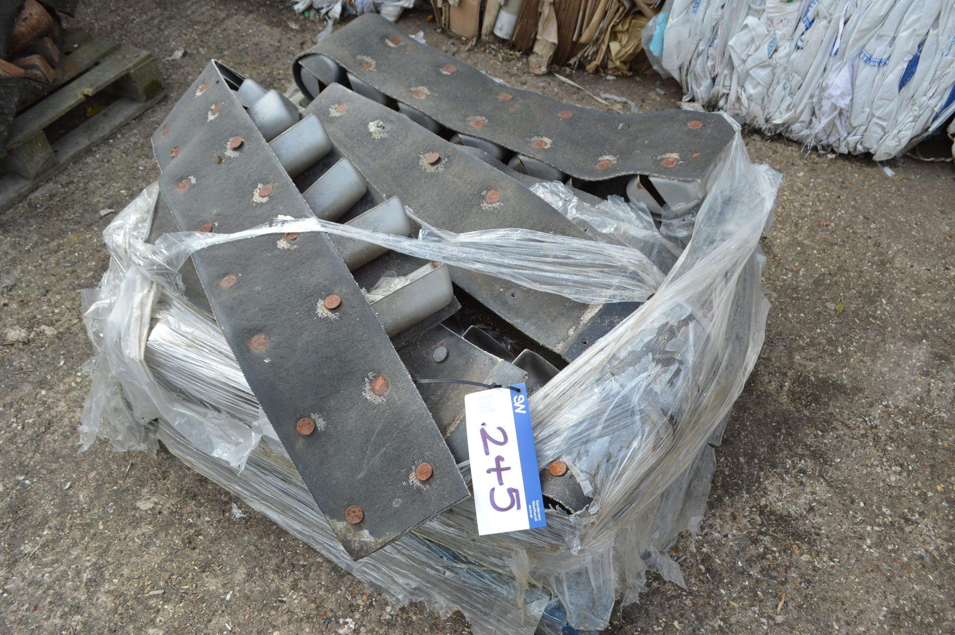 220mm Buckets, with belting on pallet. Item locate