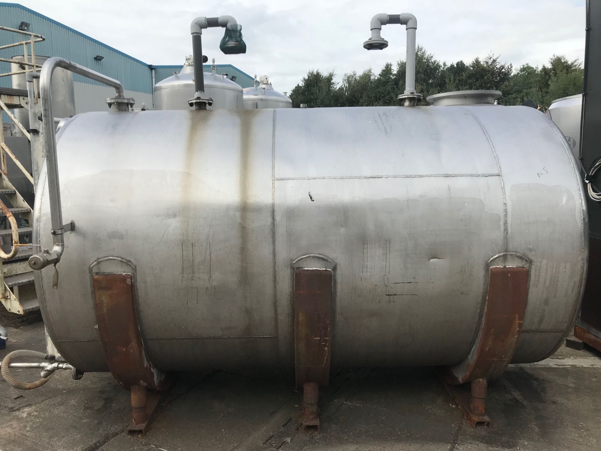 Stainless Steel Tank, with steel frame (been used