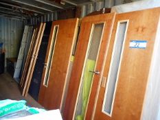 Quantity of New and Used Fire Doors as set out